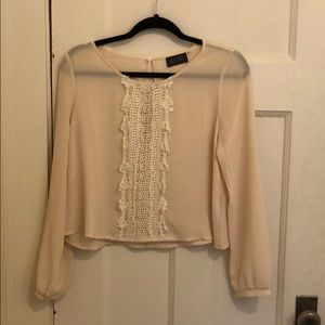 Lightweight peach blouse with lace detailing
